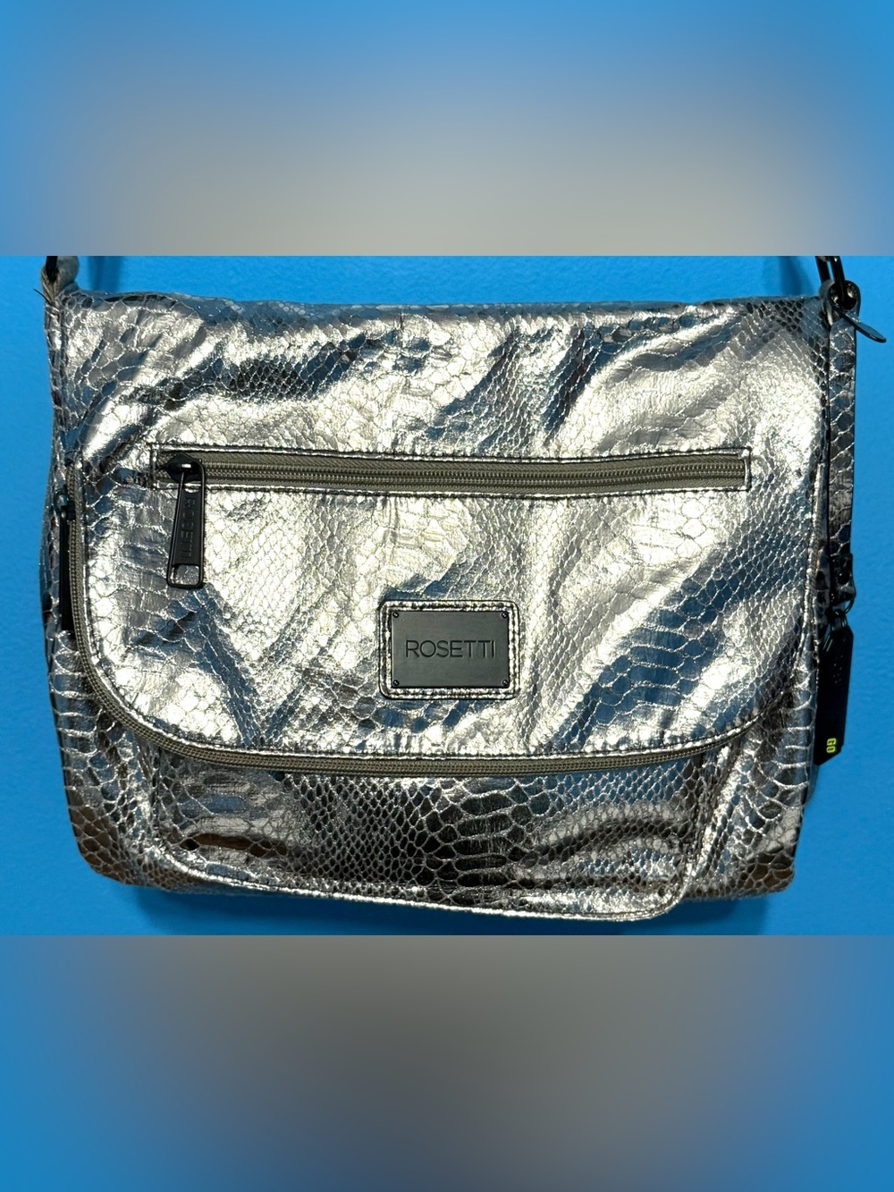 Rosetti Metallic Silver Snake-Embossed Crossbody Clutch